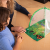 Dome shaped butterfly habitat showing the life cycle of a butterfly with realistic, plastic figurines